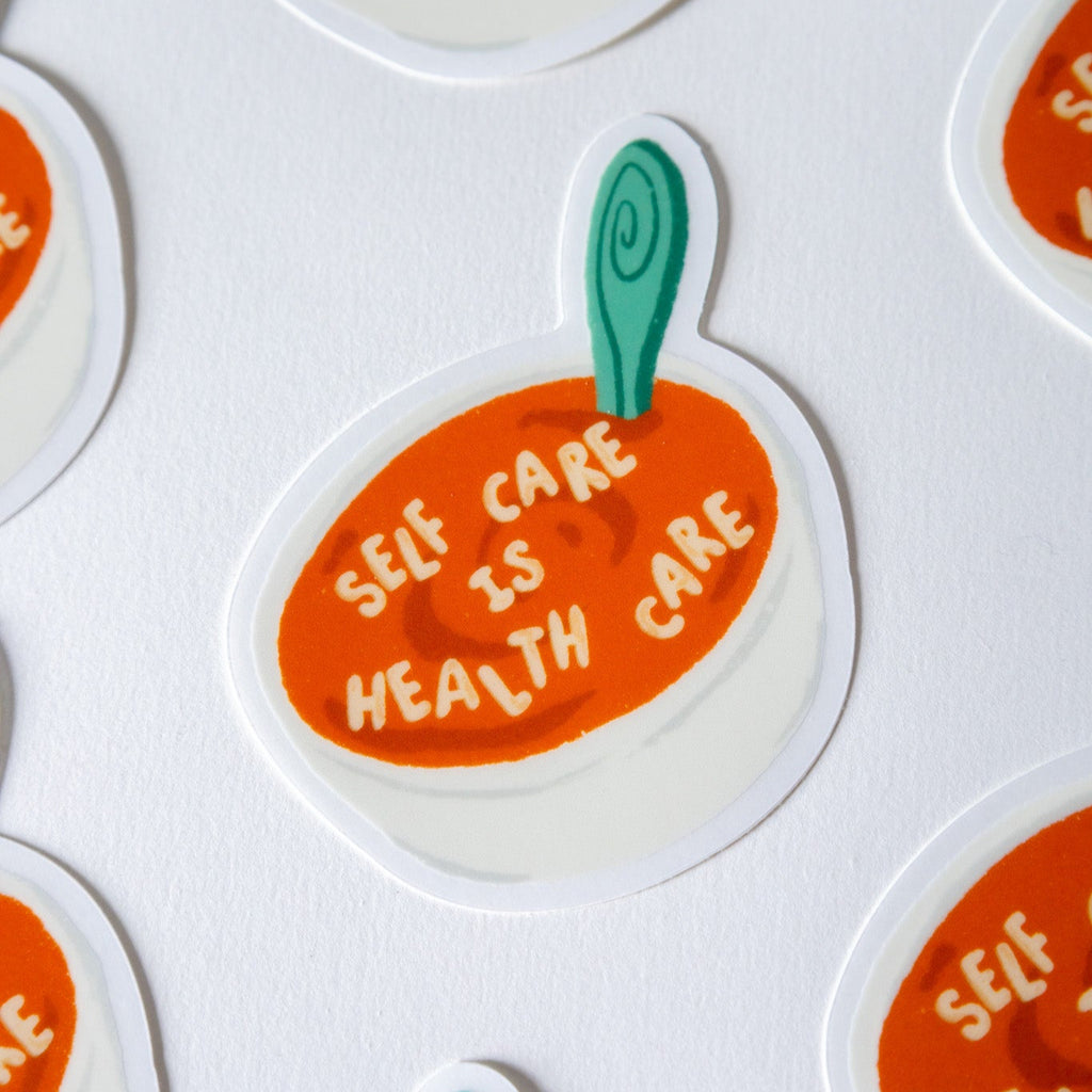 Stickers with 'Self care is health care' text on a white background
