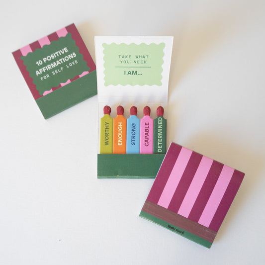 Set of colorful affirmation matches on a white background